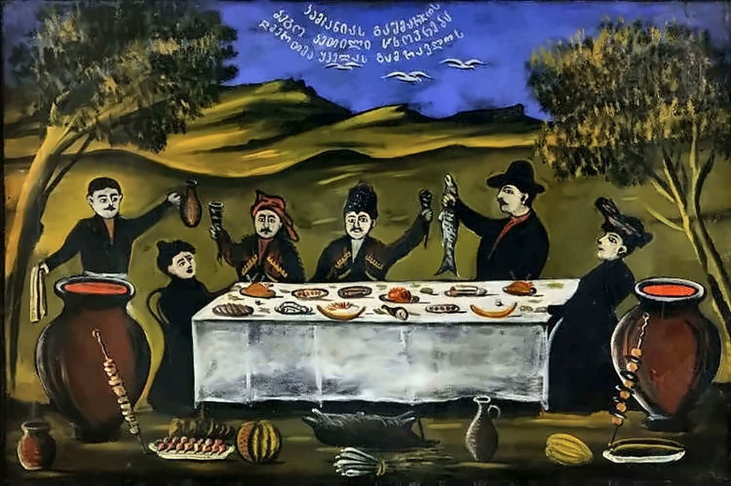 Gemälde von Niko Pirosmani: georgische Tafelszene mit Gästen an einer festlich gedeckten Tafel